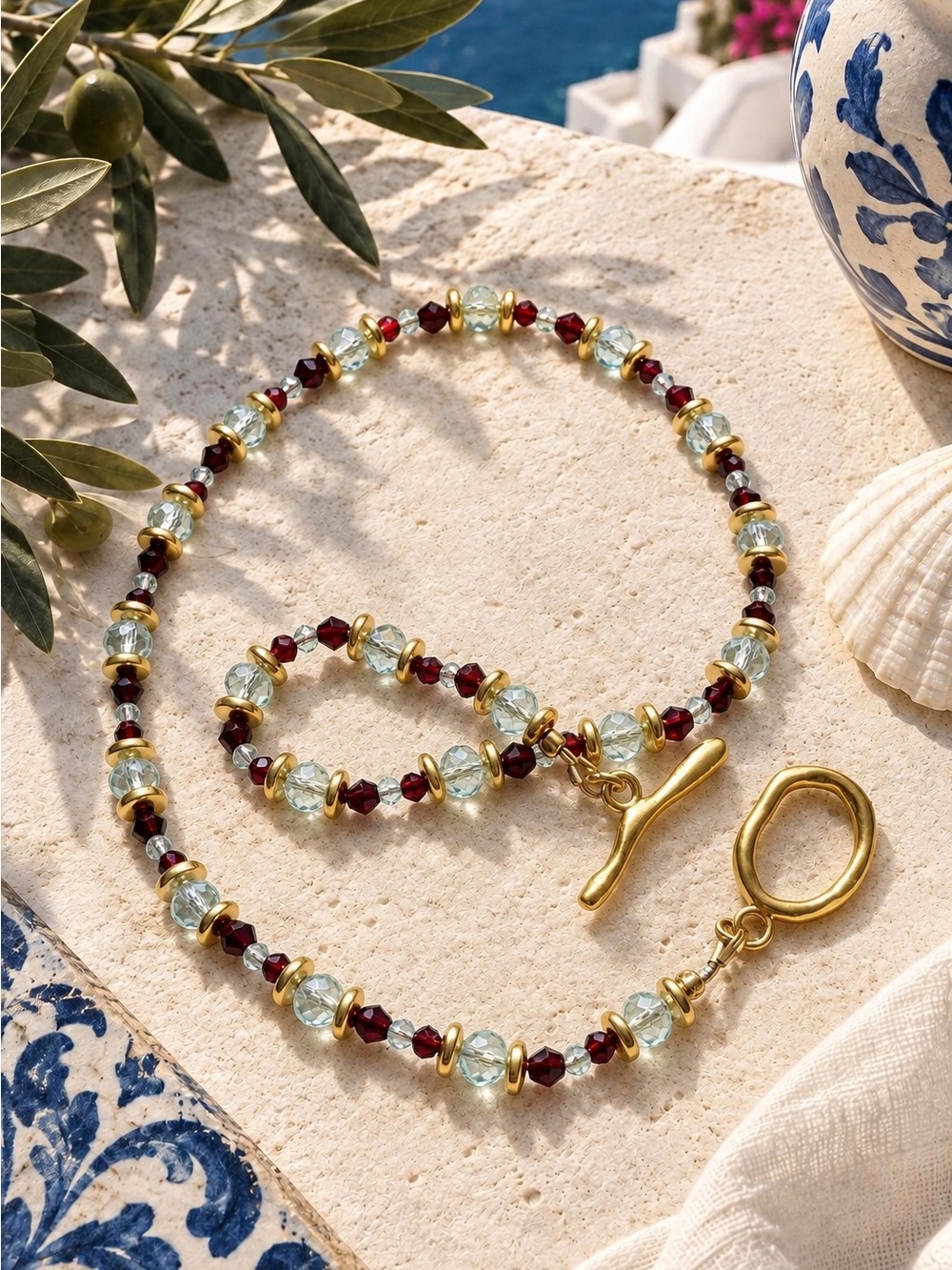 Gold-Plated Beaded Necklace with Aquamarine and Garnet Accents